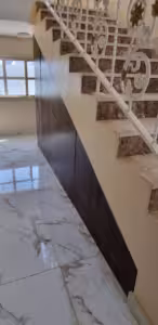 Under-stairs pull-out storage drawers